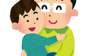 子どもを抱っこするお父さん