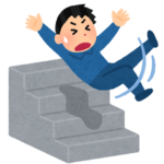 階段で転ぶ男