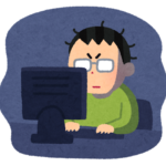 暗い部屋で作業する男