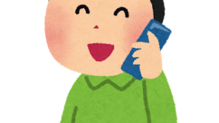 携帯電話で話す男