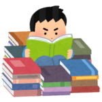 真剣に本を読む男性