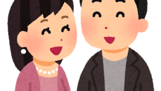 腕を組んでデートしている男女