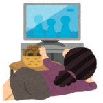 寝ながら煎餅を食べている女性